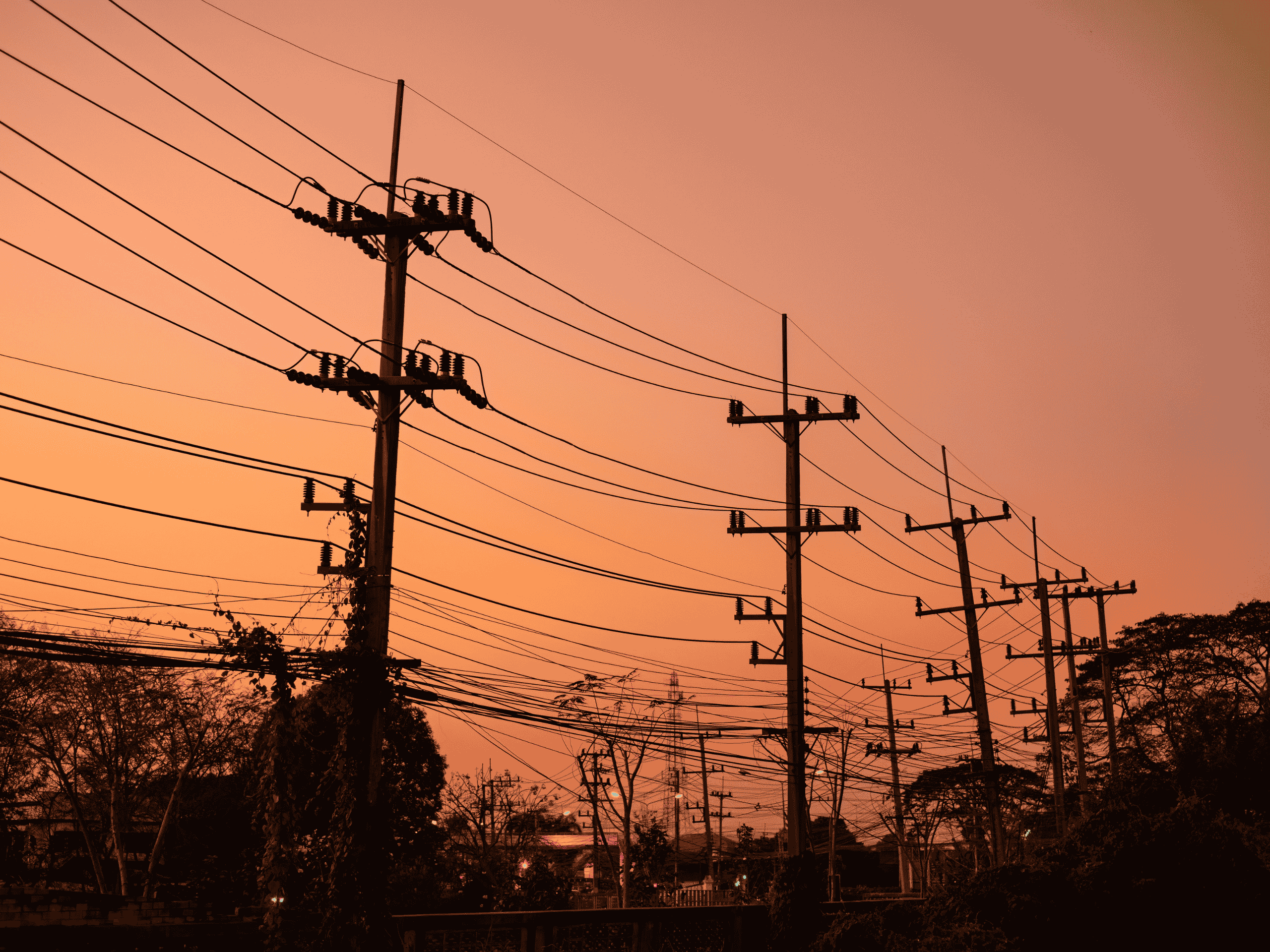 PSE powerlines at sunset transporting electricity to Eastside ratepayers.